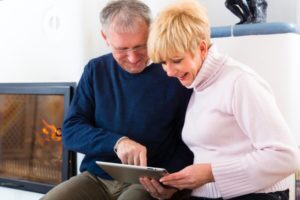 Cost Couple Sitting Near The Furnace Shutterstock 141201769